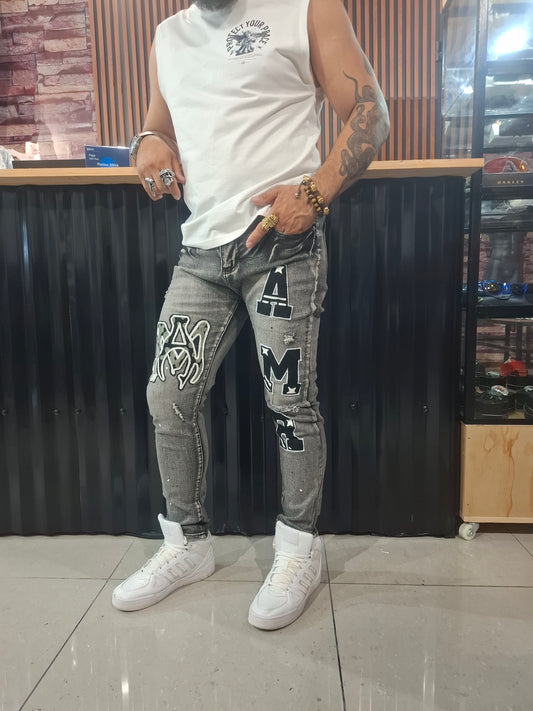 Pantalón de Mezclilla Oscuro Amiri Rasgado