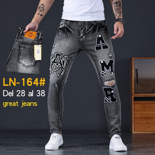 Pantalón de Mezclilla Oscuro Amiri Rasgado